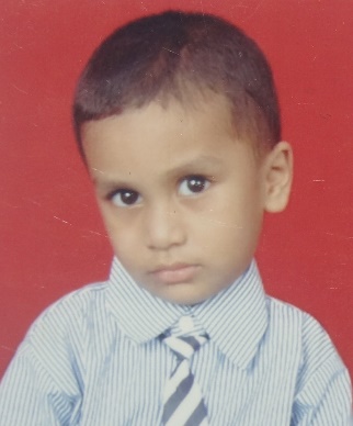 A young boy in school uniform