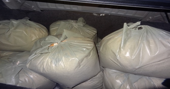 Ration bags packed for monthly distribution